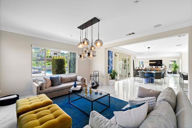 living area featuring marble finish floor, ornamental molding, a chandelier, and visible vents