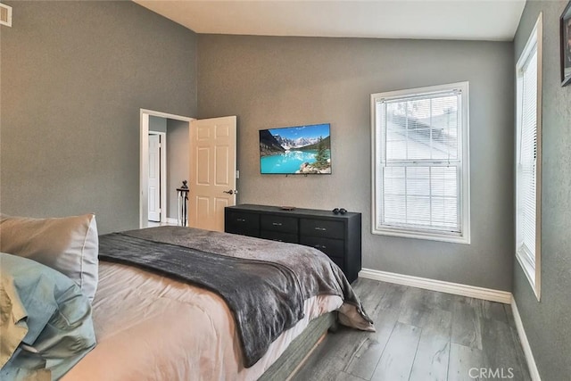 415 Jeremiah Dr Unit B, Simi Valley, CA 93065 - bedroom with visible vents, wood finished floors, lofted ceiling, and baseboards