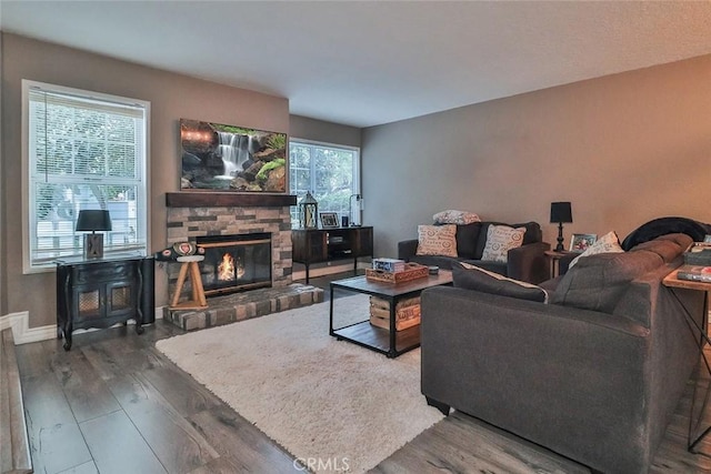 415 Jeremiah Dr Unit B, Simi Valley, CA 93065 - living room featuring a fireplace, wood finished floors, and baseboards