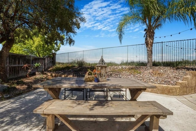 31598 Summerfield Ln, Murrieta, CA 92563 - view of patio with outdoor dining space and a fenced backyard