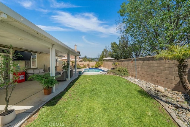 view of yard featuring a fenced in pool, a patio area, and a fenced backyard