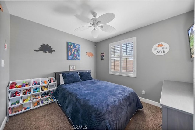 bedroom featuring baseboards, a ceiling fan, and carpet floors