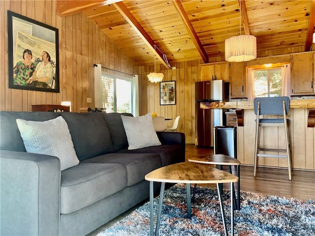 33010 Juniper Ln, Green Valley Lake, CA 92341 - living area featuring wood ceiling, wooden walls, dark wood-style floors, and a healthy amount of sunlight
