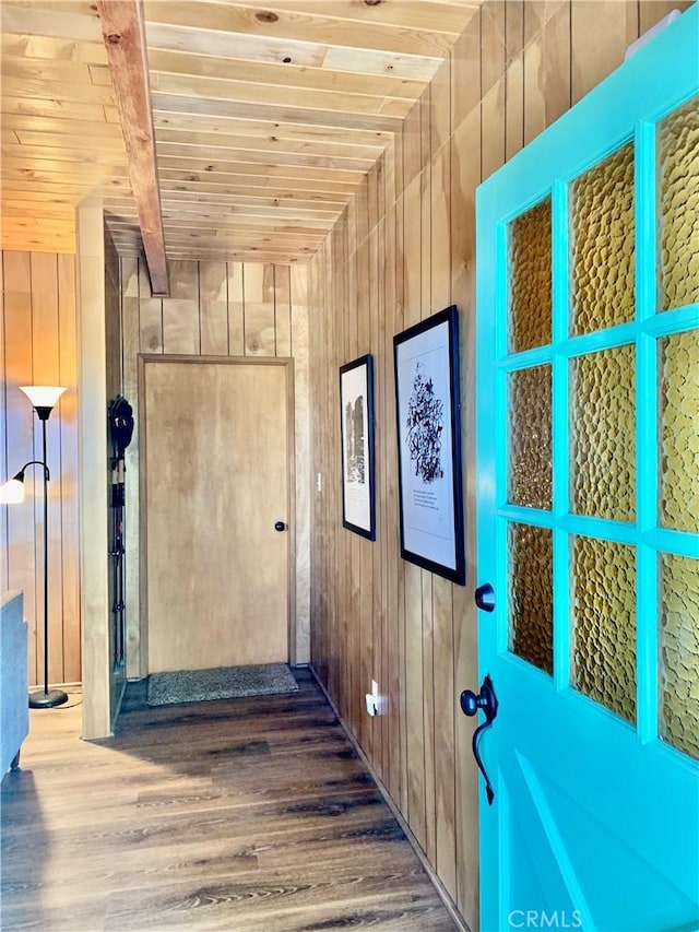 33010 Juniper Ln, Green Valley Lake, CA 92341 - entryway with wood ceiling, wood walls, wood finished floors, and beamed ceiling