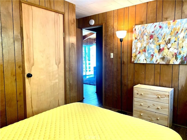33010 Juniper Ln, Green Valley Lake, CA 92341 - bedroom featuring wooden walls and wood finished floors