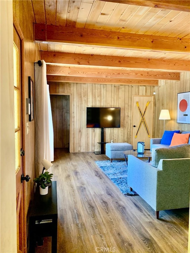 33010 Juniper Ln, Green Valley Lake, CA 92341 - living room with wood ceiling, wood walls, wood finished floors, and beam ceiling