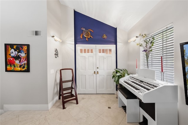 1441 San Almada Rd, Corona, CA 92882 - entryway with baseboards, visible vents, and lofted ceiling