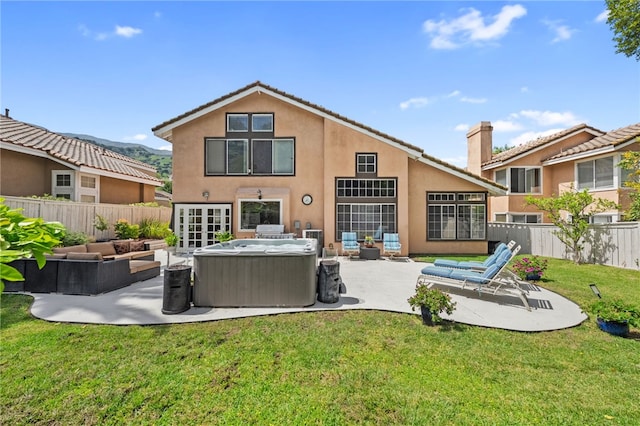 1441 San Almada Rd, Corona, CA 92882 - back of house featuring a patio, a yard, a fenced backyard, an outdoor hangout area, and stucco siding