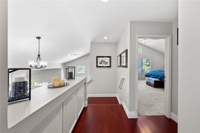 1441 San Almada Rd, Corona, CA 92882 - hallway with a healthy amount of sunlight, vaulted ceiling, and dark wood finished floors