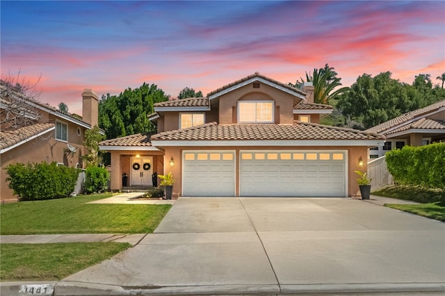 1441 San Almada Rd, Corona, CA 92882 - view of front of house featuring driveway, a tiled roof, stucco siding, a front yard, and fence