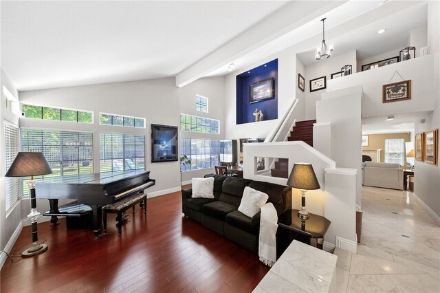 1441 San Almada Rd, Corona, CA 92882 - living room featuring baseboards, high vaulted ceiling, wood finished floors, and stairway