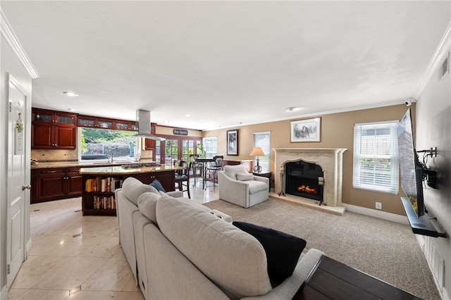 1441 San Almada Rd, Corona, CA 92882 - living area featuring baseboards, a wealth of natural light, a premium fireplace, and crown molding