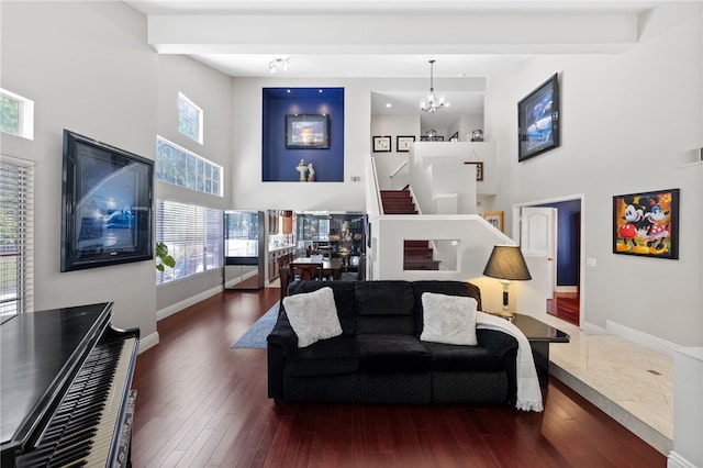 1441 San Almada Rd, Corona, CA 92882 - living room featuring stairway, a towering ceiling, a notable chandelier, and baseboards
