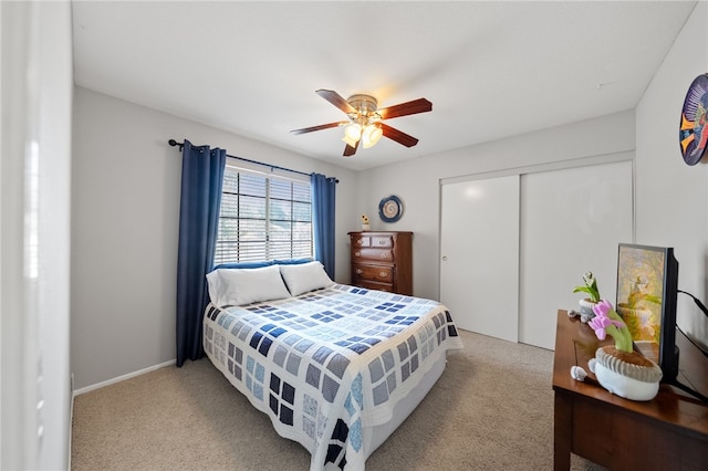 1441 San Almada Rd, Corona, CA 92882 - bedroom with a closet, ceiling fan, light carpet, and baseboards