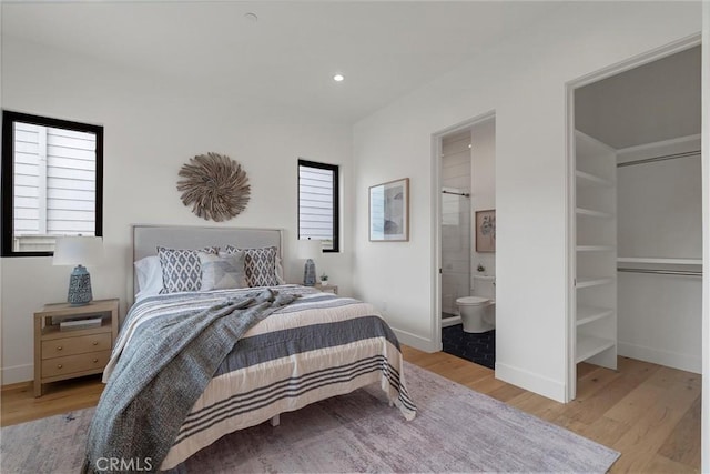 1311 18th St, Manhattan Beach, CA 90266 - bedroom with light wood-type flooring, recessed lighting, and ensuite bathroom