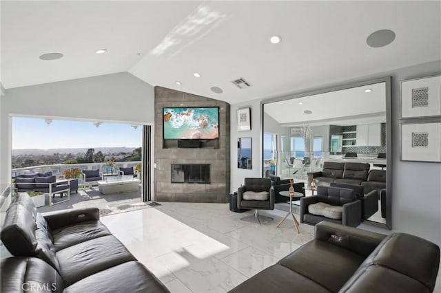 3 Via Pasa, San Clemente, CA 92673 - living area with light marble finish flooring, a tiled fireplace, healthy amount of natural light, recessed lighting, and high vaulted ceiling