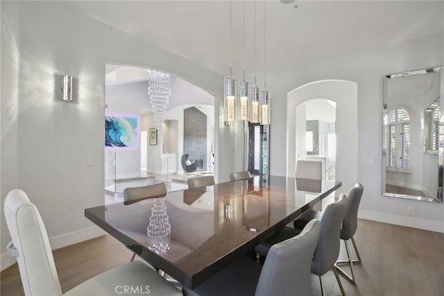 3 Via Pasa, San Clemente, CA 92673 - dining space with arched walkways and wood finished floors