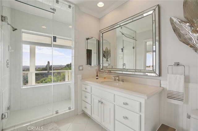 3 Via Pasa, San Clemente, CA 92673 - bathroom with a shower stall, vanity, tile patterned floors, ornamental molding, and recessed lighting