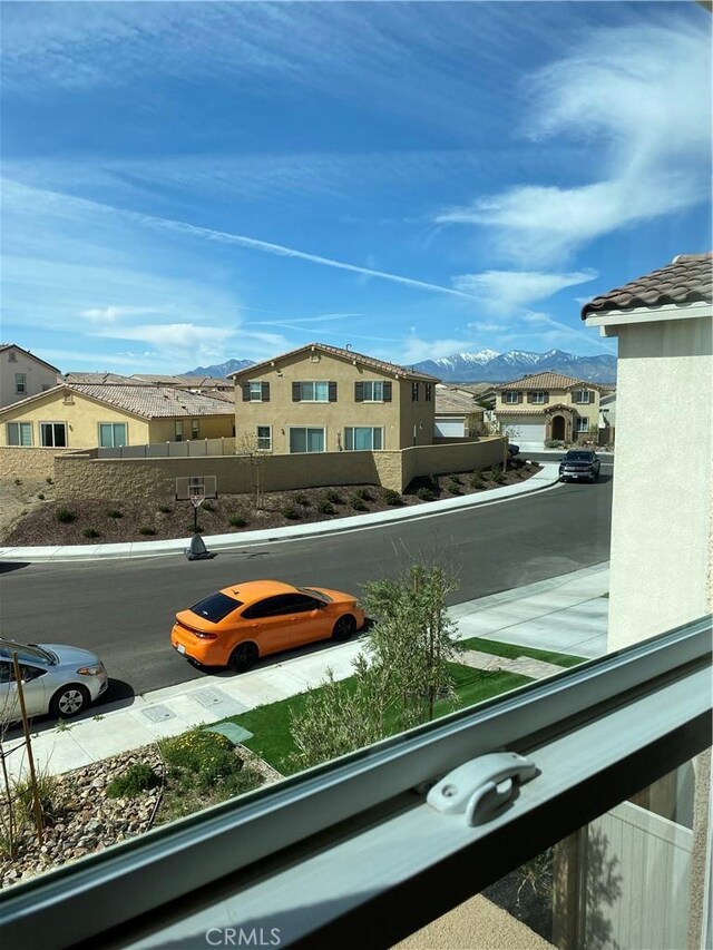 13110 Rosamond Ct, Hesperia, CA 92395 - view of car parking with a mountain view and a residential view