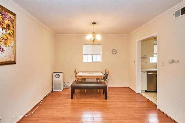 2624 W Cherry Ave, Fullerton, CA 92833 - dining room featuring plenty of natural light, ornamental molding, and light wood-style floors