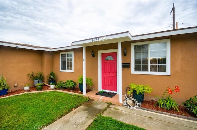 2624 W Cherry Ave, Fullerton, CA 92833 - entrance to property with stucco siding and a lawn
