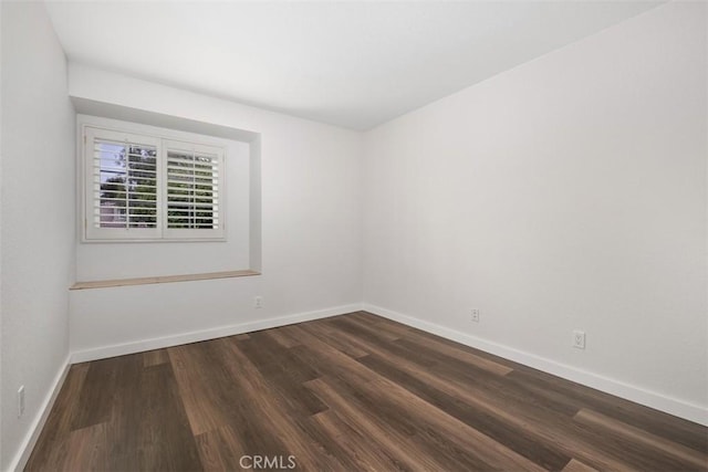 23875 Catamaran Way Unit 51, Laguna Niguel, CA 92677 - empty room featuring dark wood-type flooring and baseboards