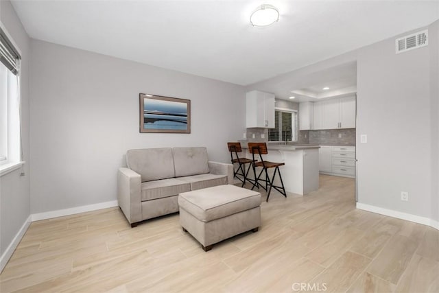 23875 Catamaran Way Unit 51, Laguna Niguel, CA 92677 - living room featuring light wood-style flooring and recessed lighting