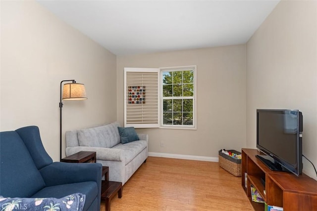 37 Rumford St, Ladera Ranch, CA 92694 - living room featuring light wood-style flooring and baseboards