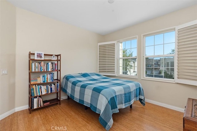 37 Rumford St, Ladera Ranch, CA 92694 - bedroom with baseboards and wood finished floors
