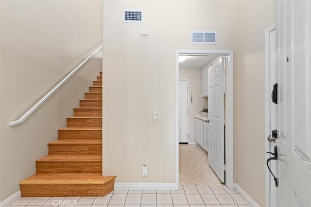 37 Rumford St, Ladera Ranch, CA 92694 - stairs with baseboards and tile patterned flooring