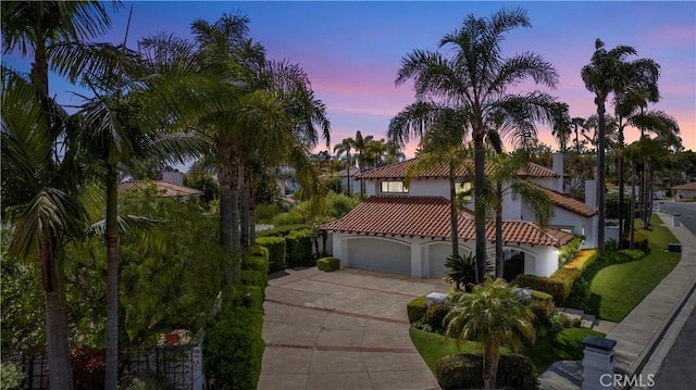 31 Terraza Del Mar, Dana Point, CA 92629 - mediterranean / spanish-style home with driveway, a tiled roof, and stucco siding