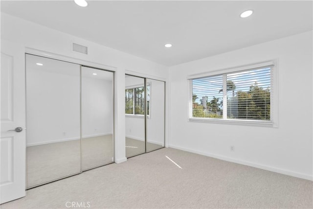 31 Terraza Del Mar, Dana Point, CA 92629 - unfurnished bedroom with multiple closets, carpet floors, recessed lighting, and baseboards