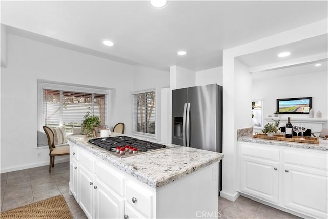 31 Terraza Del Mar, Dana Point, CA 92629 - kitchen featuring appliances with stainless steel finishes, plenty of natural light, a kitchen island, and recessed lighting