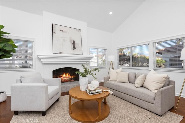 31 Terraza Del Mar, Dana Point, CA 92629 - living area with wood finished floors, plenty of natural light, a warm lit fireplace, baseboards, and recessed lighting