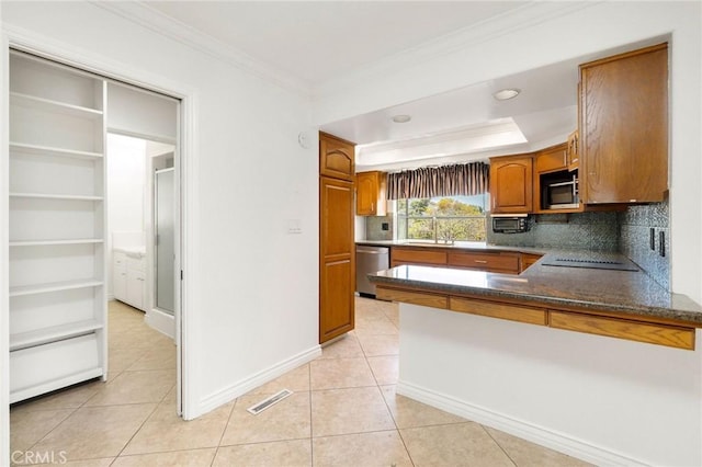 kitchen featuring stainless steel dishwasher, crown molding, a sink, visible vents, and brown cabinetry