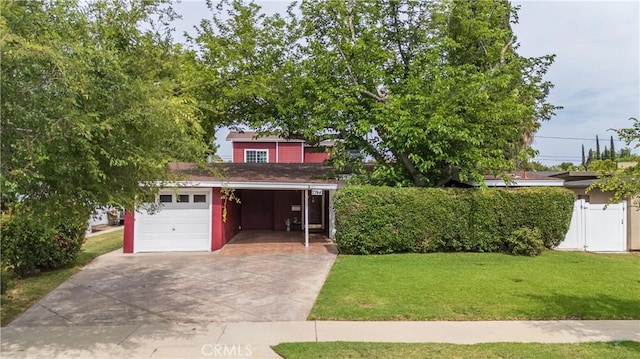 7744 Rhea Ave, Reseda, CA 91335 - view of property hidden behind natural elements with a front yard, driveway, and an attached garage