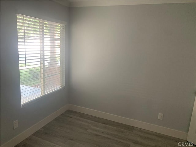 18810 Oakview Way, Lake Elsinore, CA 92530 - unfurnished room with healthy amount of natural light and dark wood-style flooring