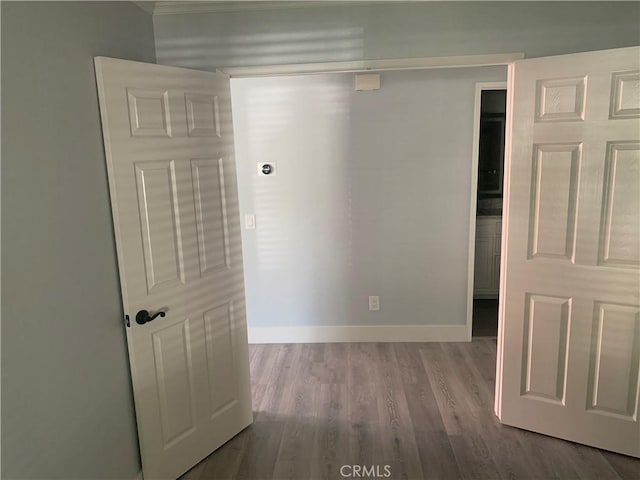 18810 Oakview Way, Lake Elsinore, CA 92530 - corridor with wood finished floors and crown molding