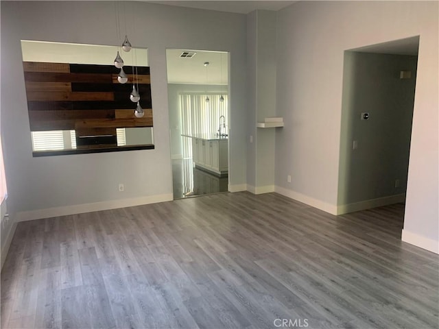 18810 Oakview Way, Lake Elsinore, CA 92530 - unfurnished room featuring wood finished floors and baseboards