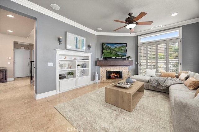 living area with visible vents, a ceiling fan, ornamental molding, light tile patterned floors, and a fireplace