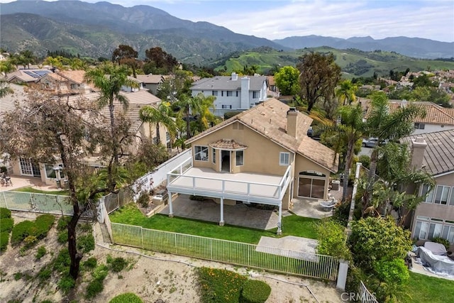bird's eye view featuring a residential view and a mountain view