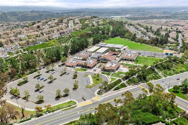 aerial view featuring a mountain view and a residential view