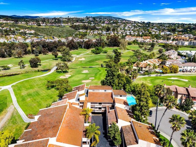 2564 Navarra Dr Unit 113, Carlsbad, CA 92009 - aerial view of residential area with a local golf course and a mountain backdrop