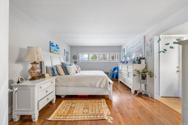 2564 Navarra Dr Unit 113, Carlsbad, CA 92009 - bedroom featuring light wood-style flooring