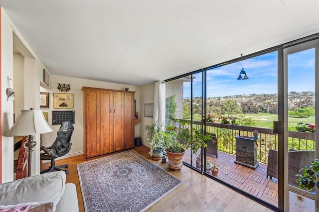 2564 Navarra Dr Unit 113, Carlsbad, CA 92009 - interior space featuring expansive windows and light wood-type flooring