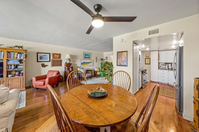 2564 Navarra Dr Unit 113, Carlsbad, CA 92009 - dining area featuring light wood finished floors and ceiling fan