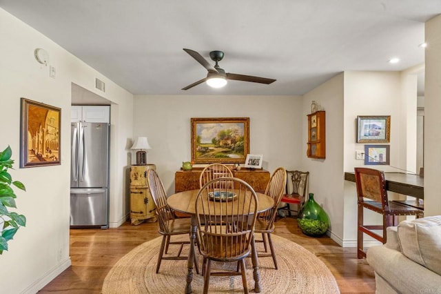 2564 Navarra Dr Unit 113, Carlsbad, CA 92009 - dining space featuring wood finished floors, ceiling fan, baseboards, and recessed lighting