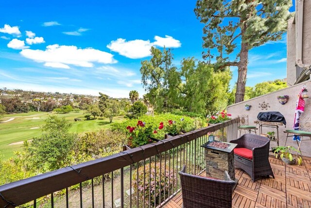 2564 Navarra Dr Unit 113, Carlsbad, CA 92009 - deck with a fire pit and golf course view