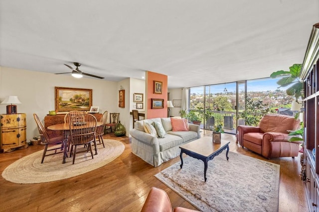 2564 Navarra Dr Unit 113, Carlsbad, CA 92009 - living area featuring a wall of windows, wood finished floors, and a ceiling fan