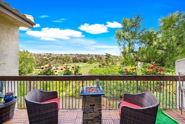 2564 Navarra Dr Unit 113, Carlsbad, CA 92009 - deck featuring an outdoor fire pit and golf course view